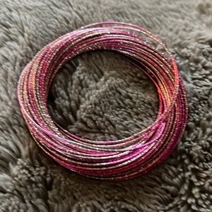 Pink interconnected bracelets